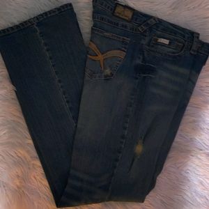 Retro Baby Phat distressed jeans